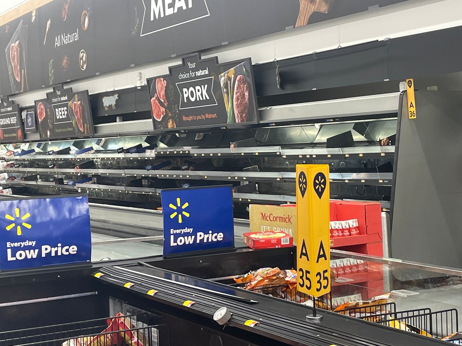 Many shelves are bare in the Okeechobee Walmart after Hurricane Ian damaged the distribution centers in Arcadia and Ft. Myers.